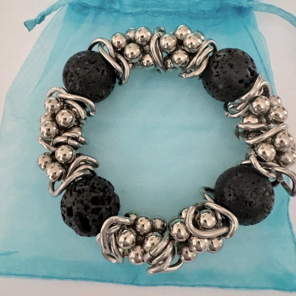 Silver tone and black bead elasticized bracelet